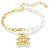 Pulsera Idyllia Perla de cristal, Talla redonda, Osito, Tono dorado, Baño tono oro