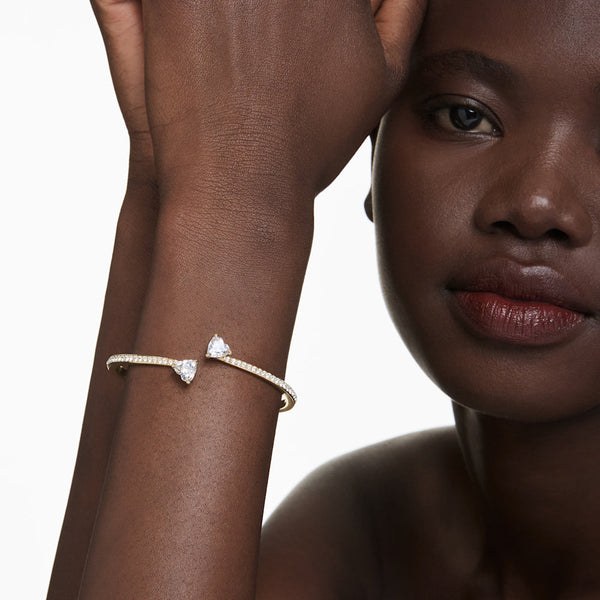 Brazalete Mesmera Attract, Corazón, Blanco, Baño tono oro