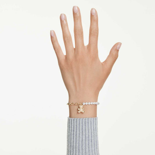 Pulsera Idyllia Perla de cristal, Talla redonda, Osito, Tono dorado, Baño tono oro